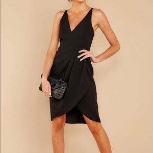Black dress, brand new in original package, never worn.